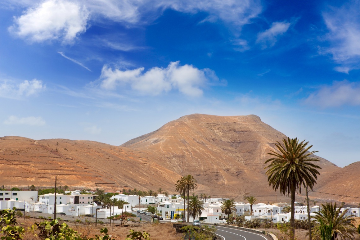 'Lanzarote Yaiza white houses village under volcanic mountains of Canary Islands' - Lanzarote